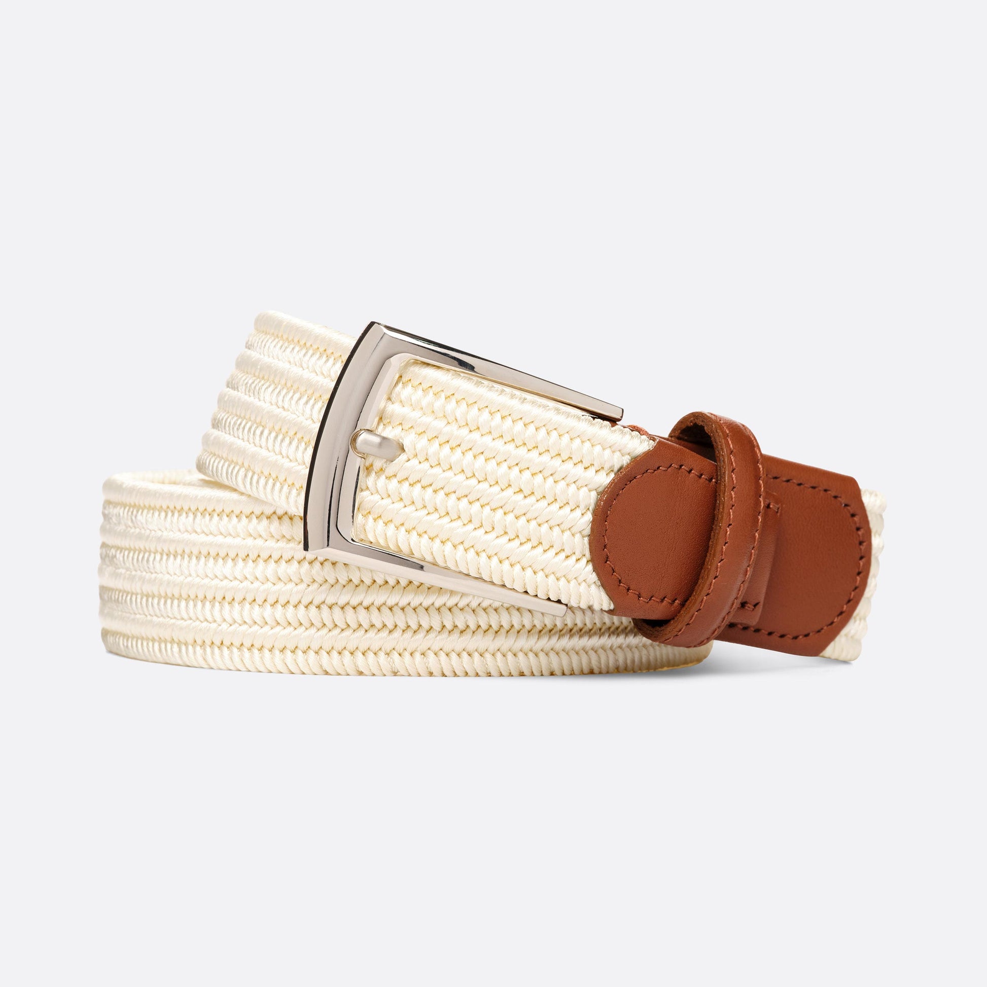 A woven mens belt in cream with a brown leather tip and a silver-tone metal buckle
